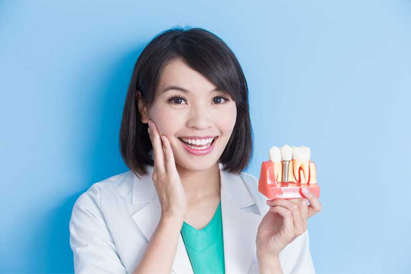 Girl With Model of Crown