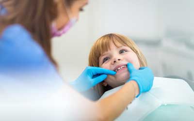 Doctor with Child Patient